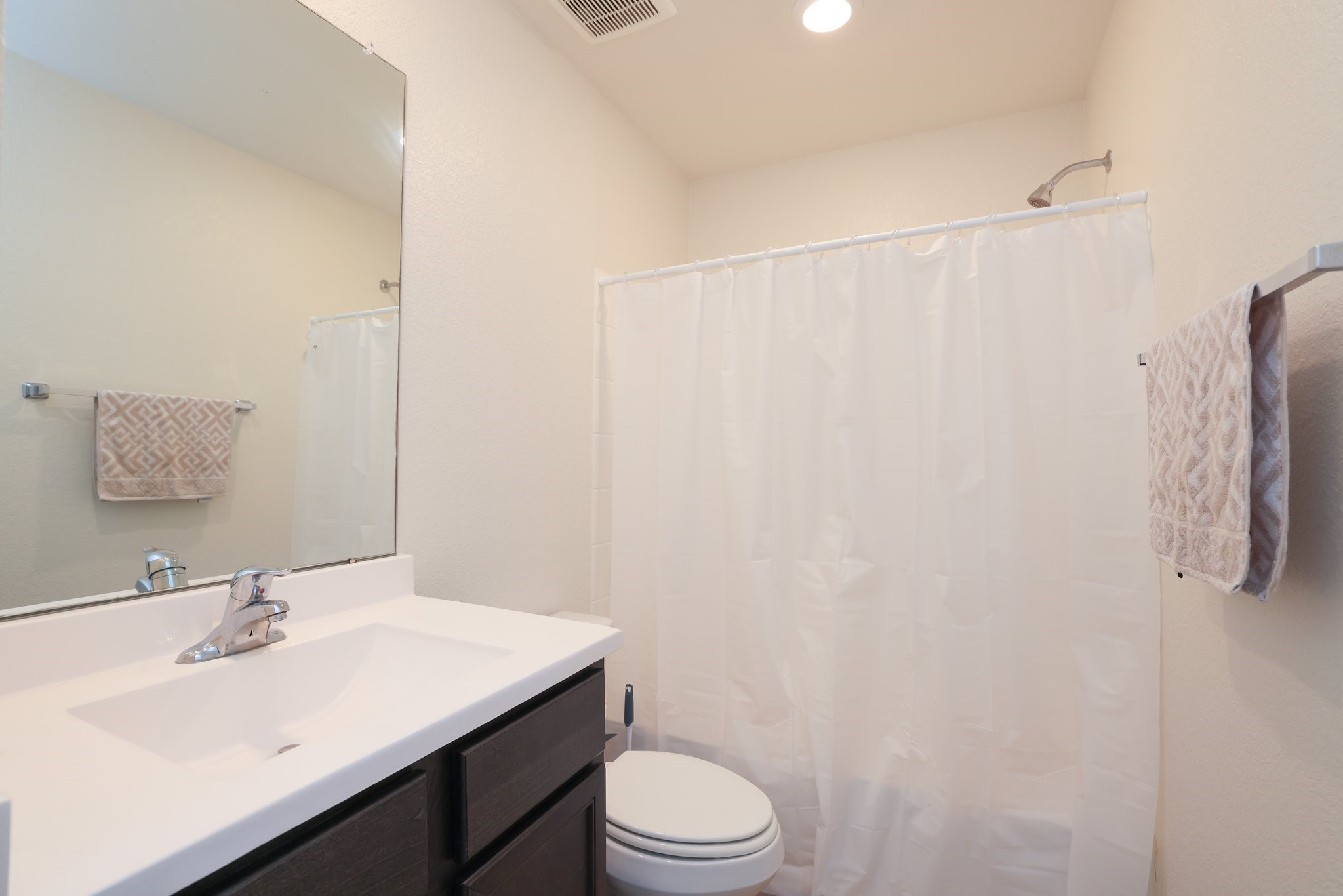 20914 Solstice Point Drive Hockley, TX 77447 - Photo 21 of 27 a bathroom with a sink toilet and vanity