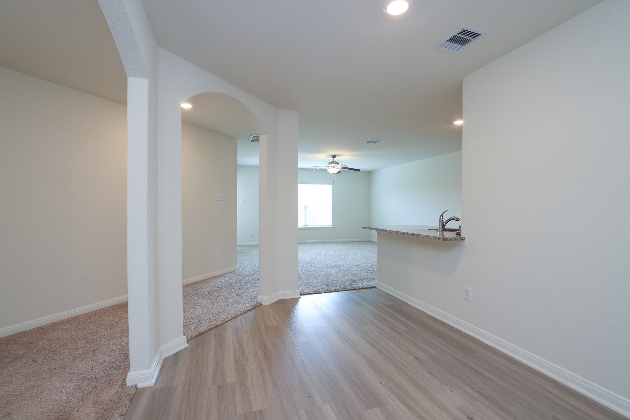 20914 Solstice Point Drive Hockley, TX 77447 - Photo 5 of 27 a view of empty room with wooden floor