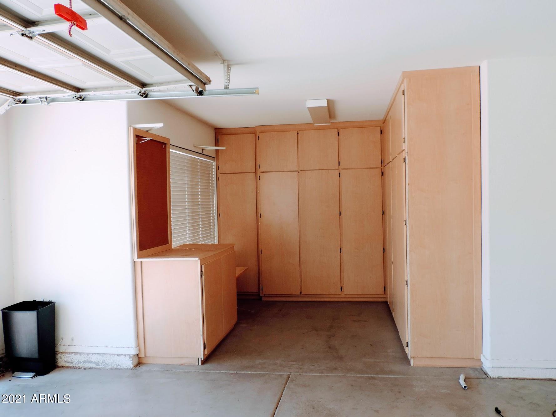 6710 West Del Rio Street Chandler, AZ 85226 - Photo 23 of 33 Storage Cabinet and Work Bench in garage
