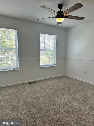 a view of a window in an empty room