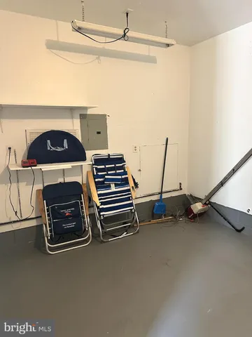 a view of an empty room with furniture