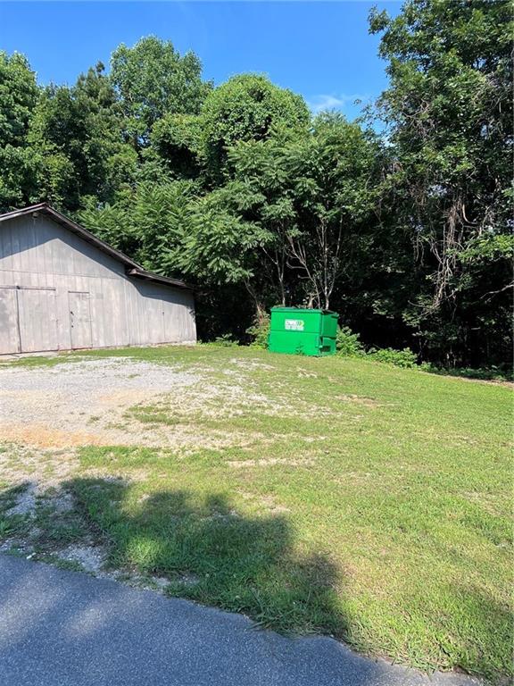 1160 Roach Hollow Road Ringgold, GA 30736 - Photo 5 of 14 a backyard of a house with lots of green space