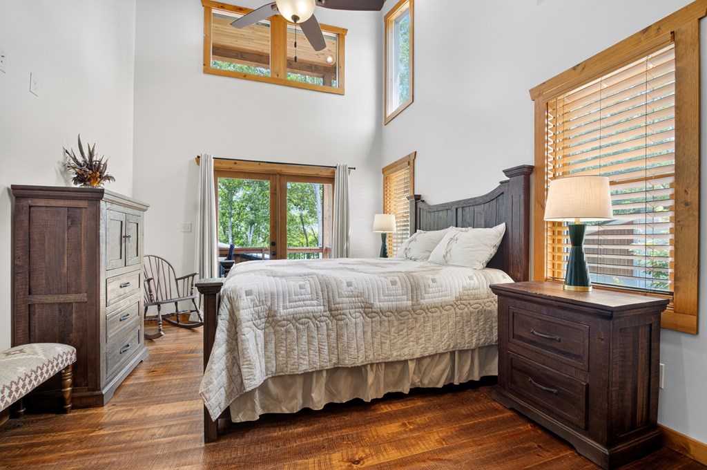 558 Tipton Springs Road Morganton, GA 30560 - Photo 19 of 66 a bedroom with a bed and wooden floor