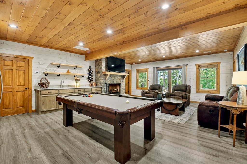 558 Tipton Springs Road Morganton, GA 30560 - Photo 23 of 66 a living room with stainless steel appliances kitchen island furniture and a table