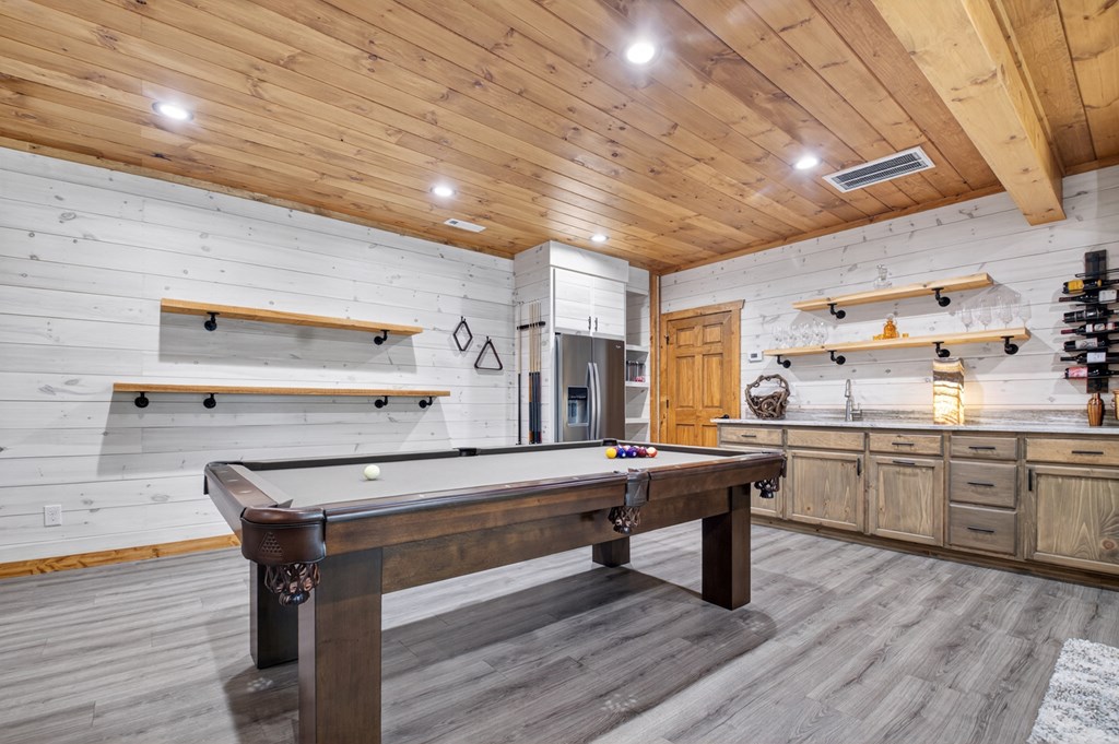 558 Tipton Springs Road Morganton, GA 30560 - Photo 31 of 66 a room with stainless steel appliances wooden floors and wooden floors