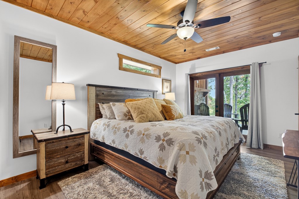 558 Tipton Springs Road Morganton, GA 30560 - Photo 33 of 66 a bed room with a bed and a night stand