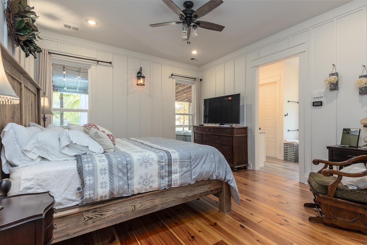 570 Wildwood Road Eads, TN 38028 - Photo 13 of 38 a bedroom with a bed and a flat screen tv