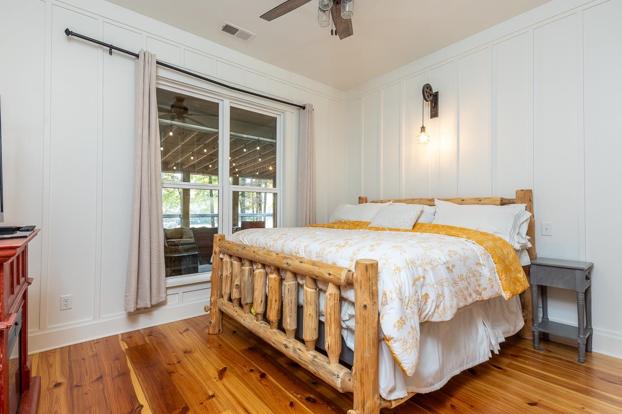 570 Wildwood Road Eads, TN 38028 - Photo 16 of 38 a large bed sitting in a bedroom next to a window