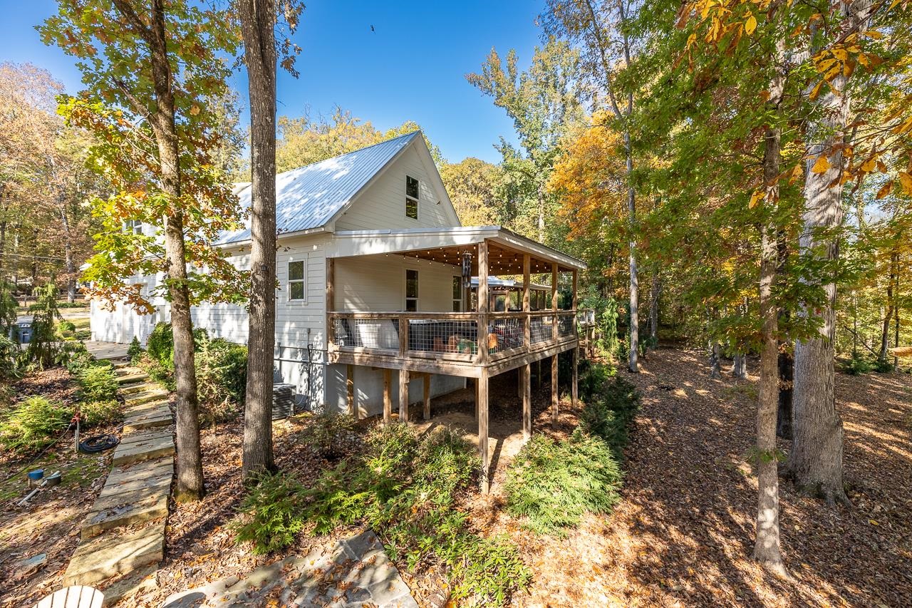 570 Wildwood Road Eads, TN 38028 - Photo 30 of 38 a view of a house with backyard and sitting area