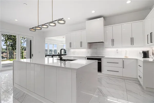 a bathroom with a toilet and a mirror