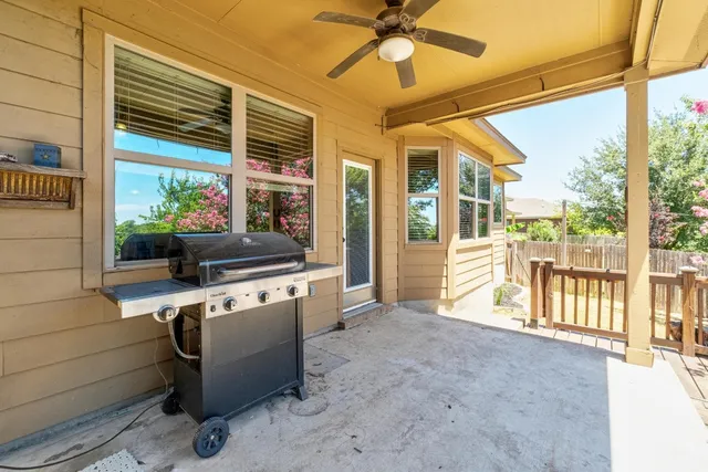 a kitchen with stainless steel appliances granite countertop a stove and a refrigerator
