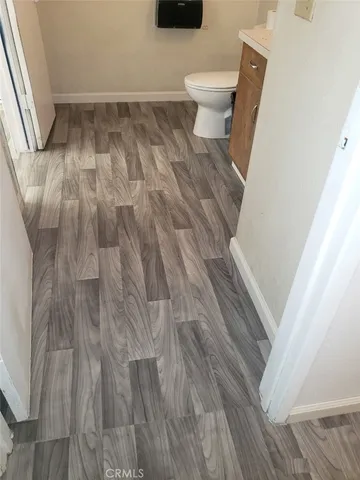 a view of a toilet in a bathroom