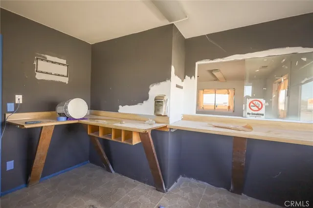 a view of a room with two chandeliers