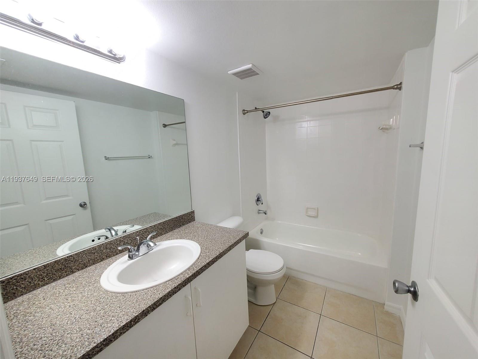 5041 Wiles Road, Unit 106 Coconut Creek, FL 33073 - Photo 3 of 25