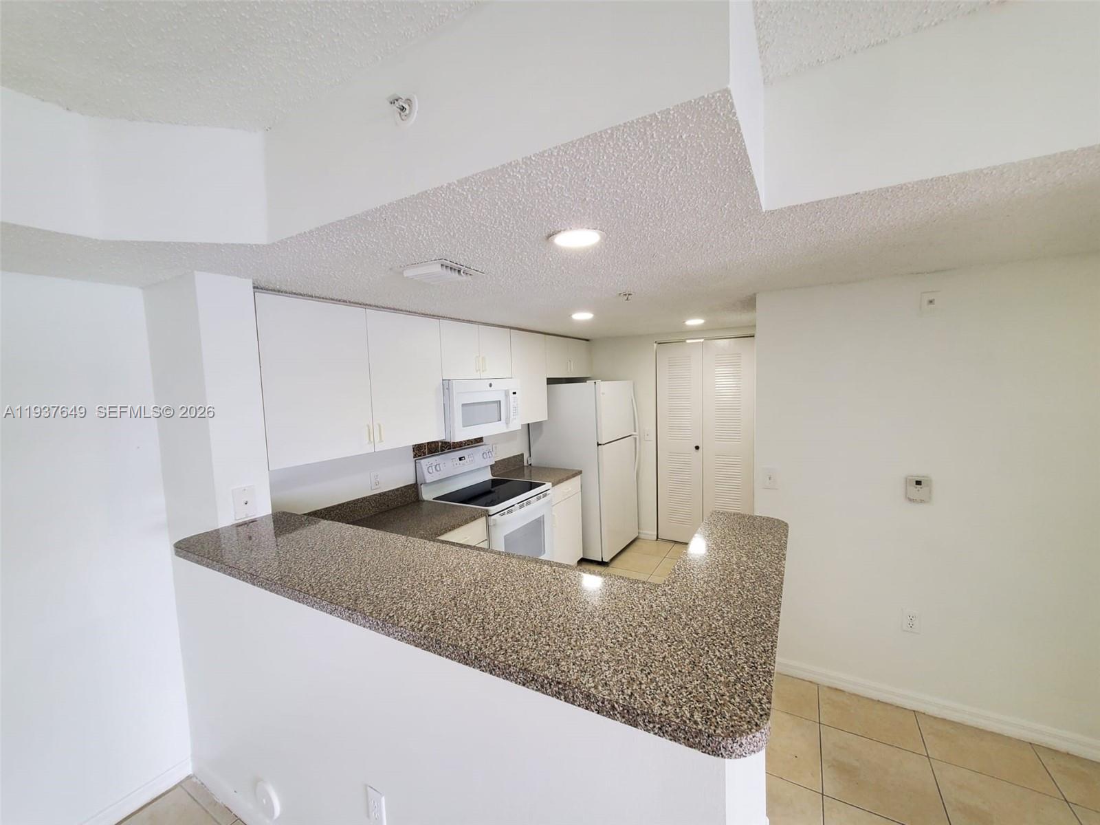 5041 Wiles Road, Unit 106 Coconut Creek, FL 33073 - Photo 5 of 25