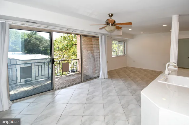 a view of an empty room and window