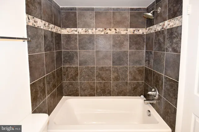 a bathroom with a bathtub