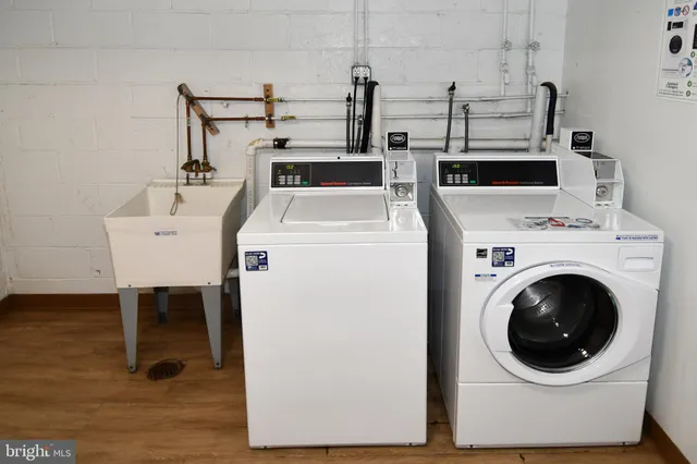 a utility room with dryer and washer