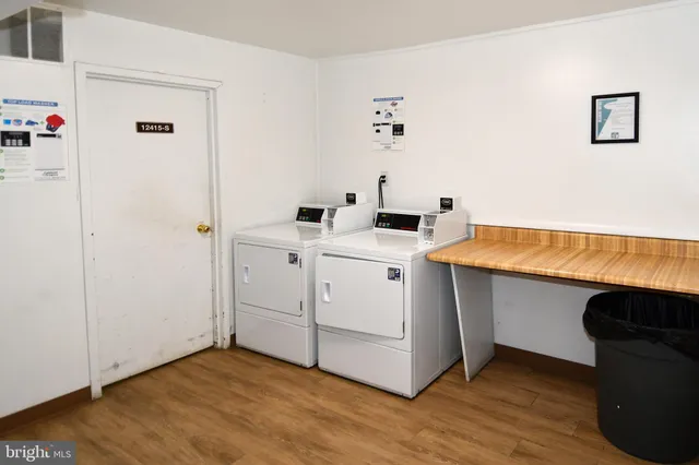 a utility room with washer and dryer