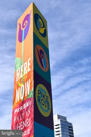 a view of a building with traffic signal lights