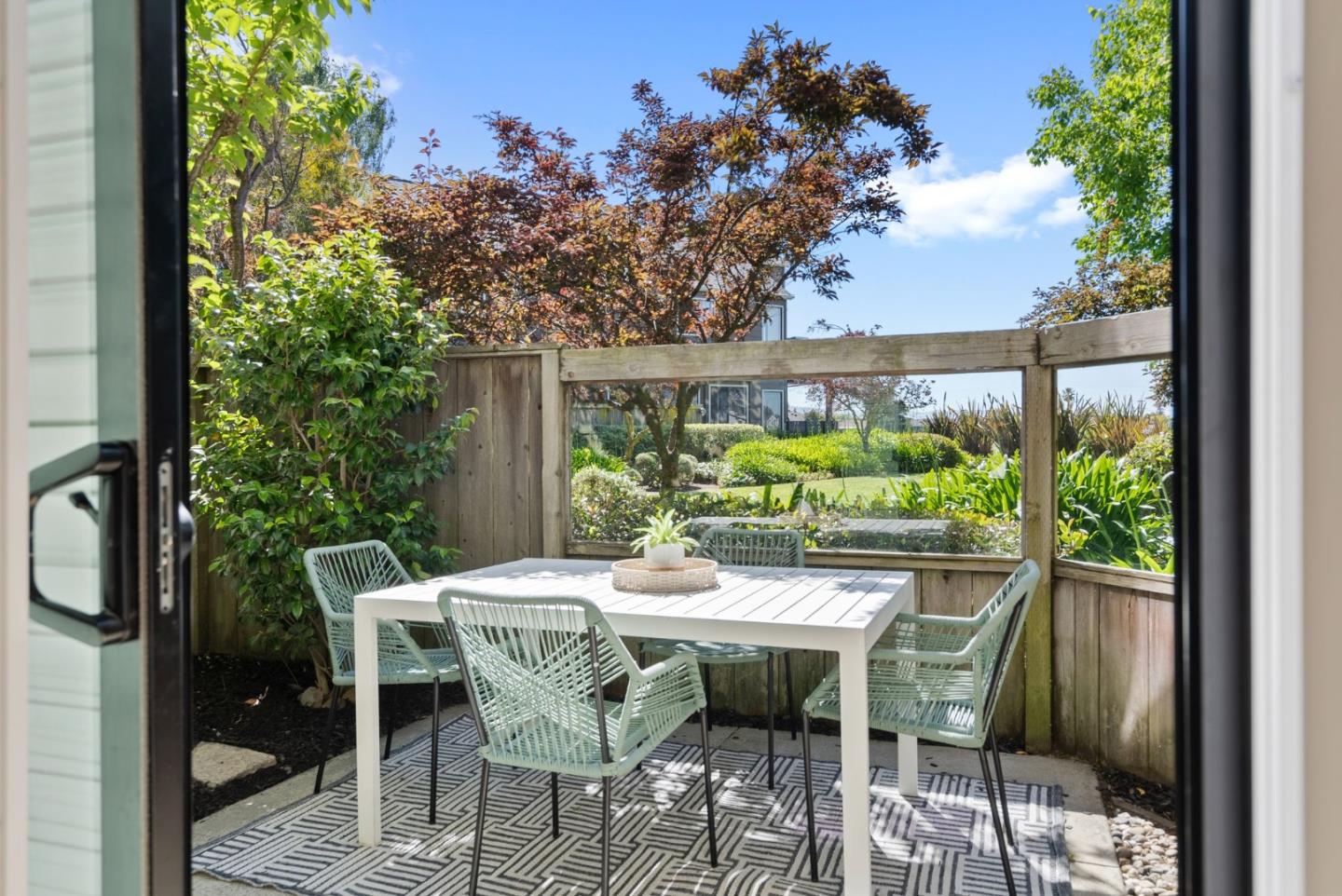 1020 Shoreline Drive San Mateo, CA 94404 - Photo 25 of 46 a dining room with furniture and garden view