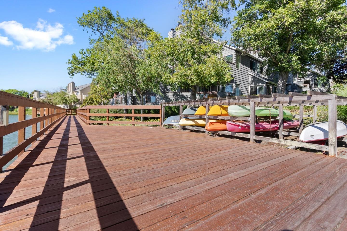 1020 Shoreline Drive San Mateo, CA 94404 - Photo 36 of 46 a street view with parked cars