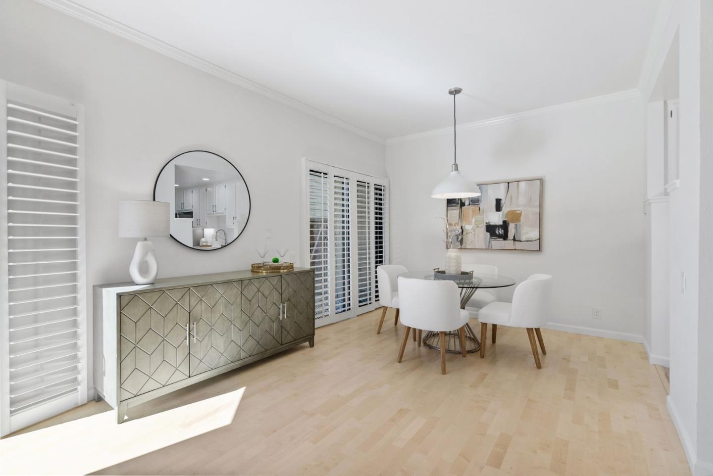 1020 Shoreline Drive San Mateo, CA 94404 - Photo 10 of 46 a living room with furniture a window and a chandelier