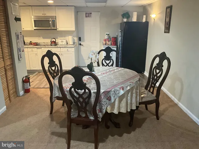 a view of a dining room with furniture