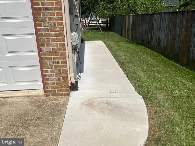 a view of backyard with green space