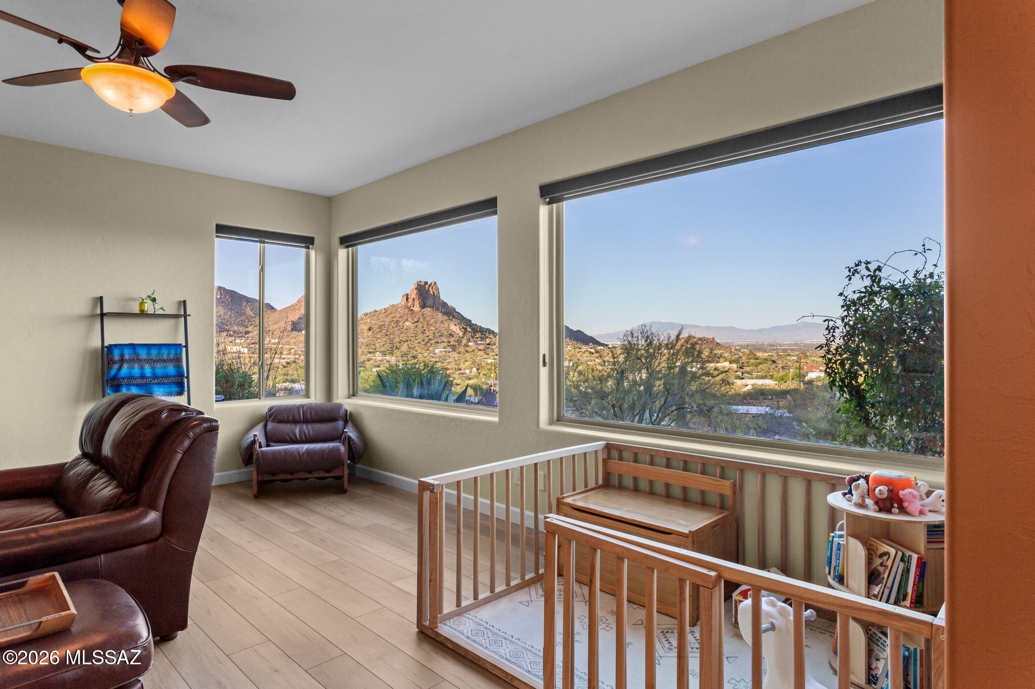 4210 West Mossman Road Tucson, AZ 85746 - Photo 14 of 51 a living room with furniture and a floor to ceiling window