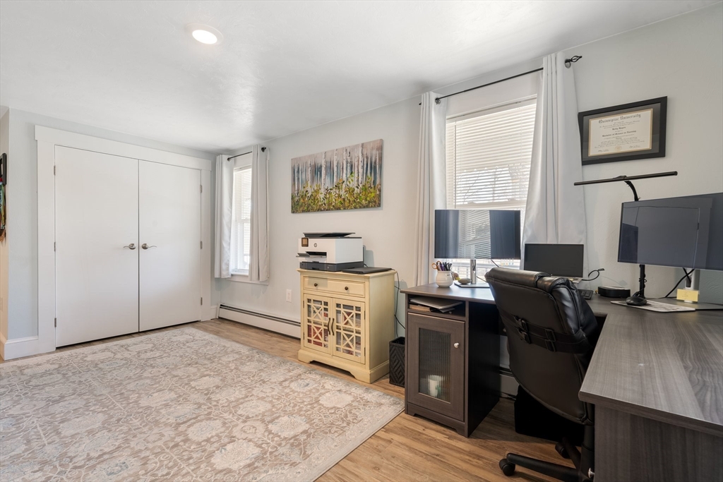 9 Riverside Road Billerica, MA 01821 - Photo 18 of 42 a view of a workspace with furniture and a window