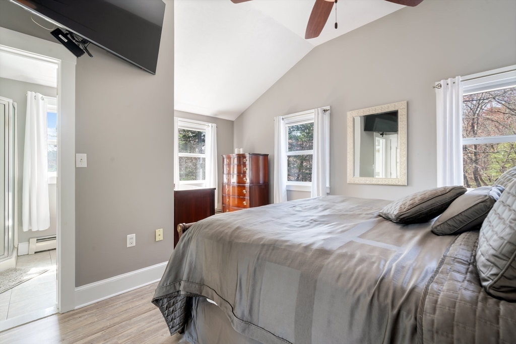 9 Riverside Road Billerica, MA 01821 - Photo 26 of 42 a bedroom with a bed and a window