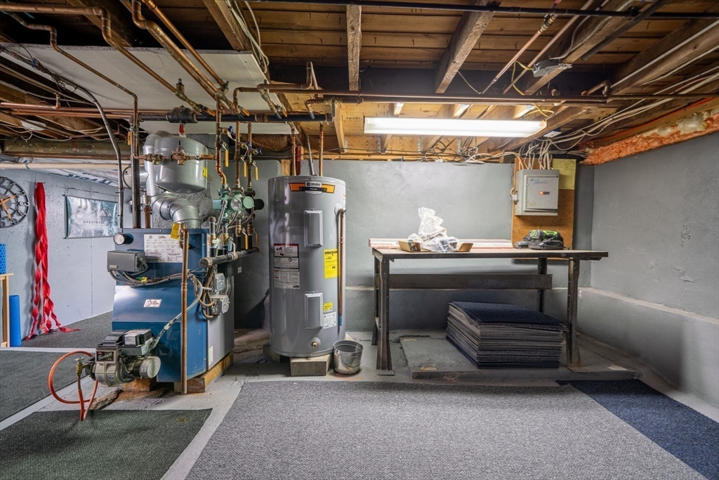 9 Riverside Road Billerica, MA 01821 - Photo 30 of 42 a room with gym equipment