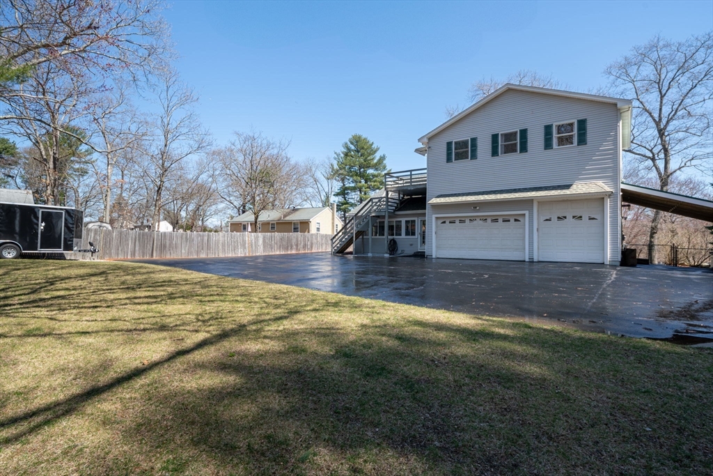 9 Riverside Road Billerica, MA 01821 - Photo 3 of 42 a view of house with outdoor space