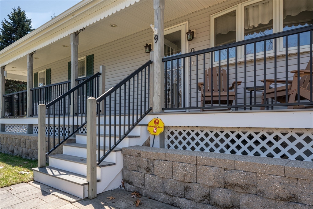 9 Riverside Road Billerica, MA 01821 - Photo 35 of 42 a view of a balcony with chairs