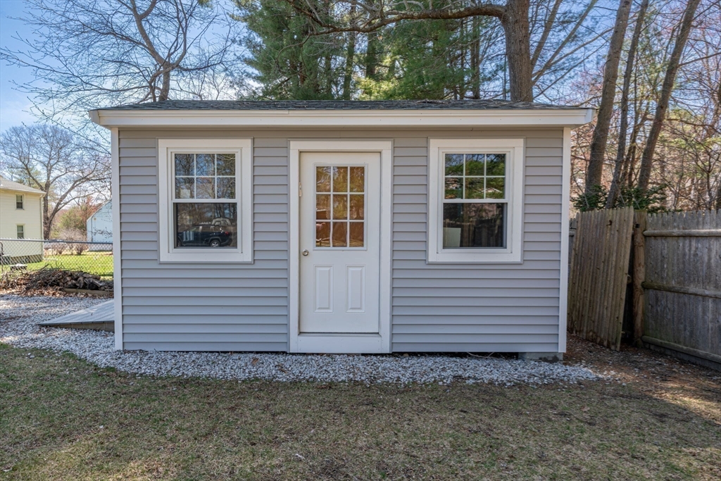 9 Riverside Road Billerica, MA 01821 - Photo 37 of 42 a view of a house with a yard