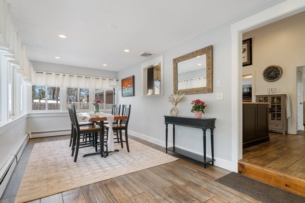 9 Riverside Road Billerica, MA 01821 - Photo 4 of 42 a view of a dining room with furniture and wooden floor