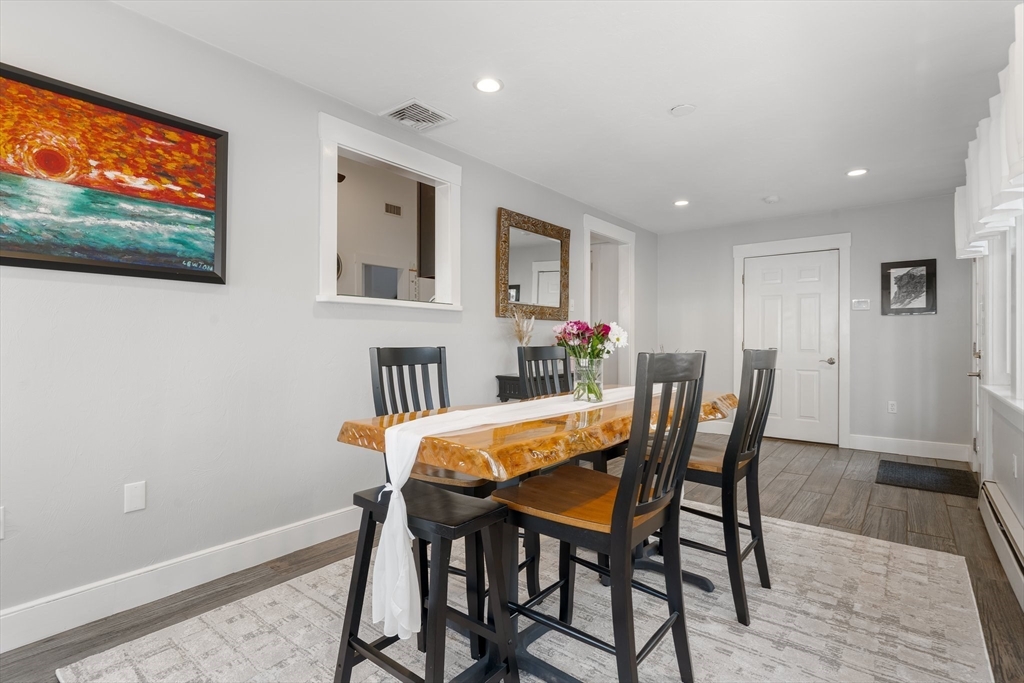 9 Riverside Road Billerica, MA 01821 - Photo 5 of 42 a view of a dining room with furniture