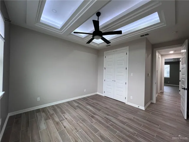 a view of an empty walk in closet