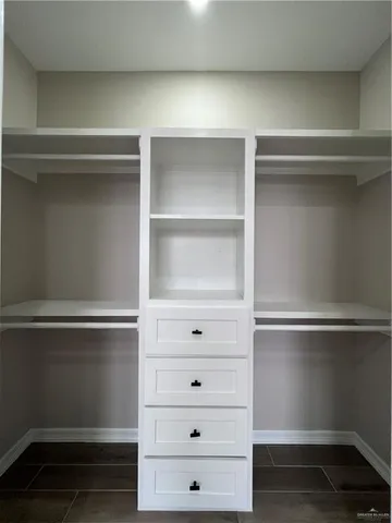 a bathroom with a sink a toilet a mirror and vanity