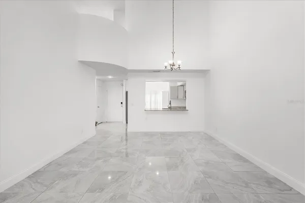a view of a kitchen with a sink and a window