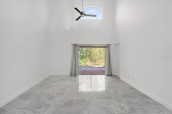 an empty room with windows