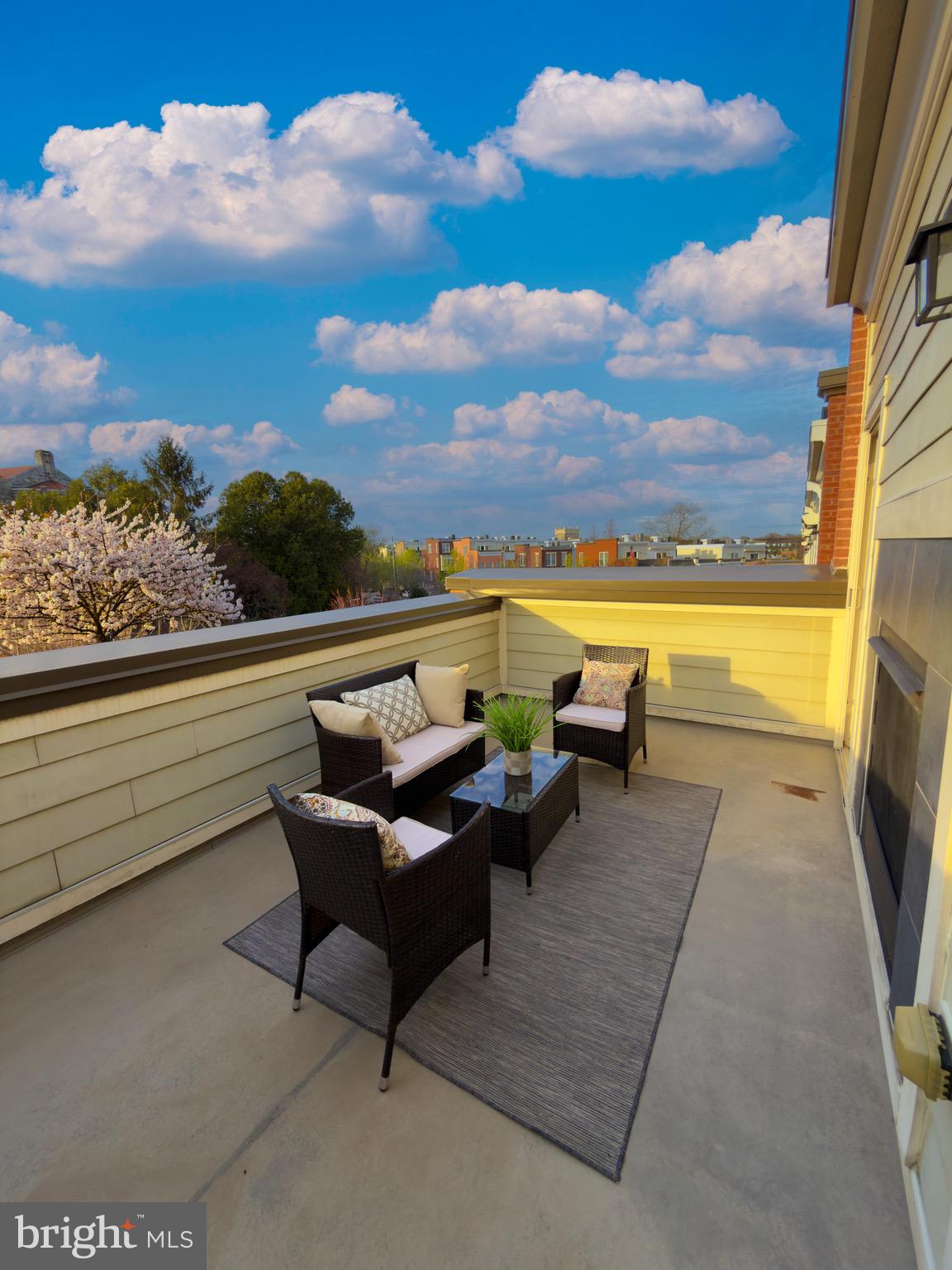 2909 Chancellor's Way Northeast Washington, DC 20017 - Photo 28 of 31 a view of a terrace with outdoor seating