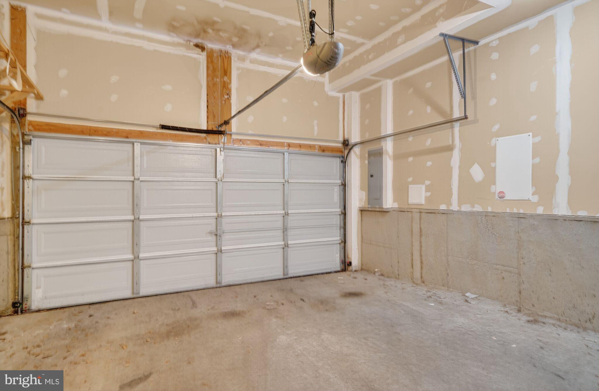 2909 Chancellor's Way Northeast Washington, DC 20017 - Photo 29 of 31 a view of a garage with racks on the wall