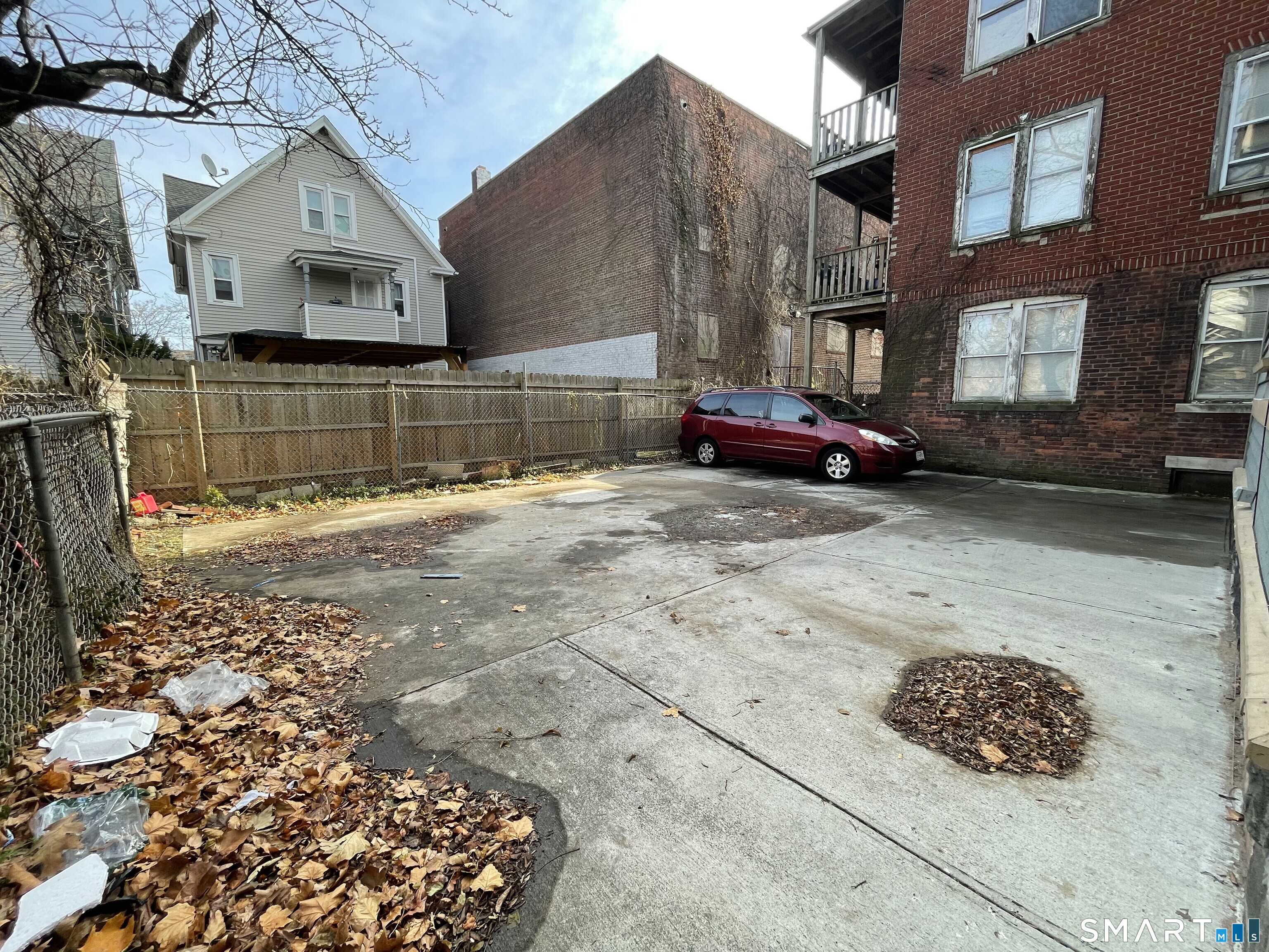 Undisclosed Address Bridgeport, CT 06608 - Photo 10 of 10 a view of a house with a yard