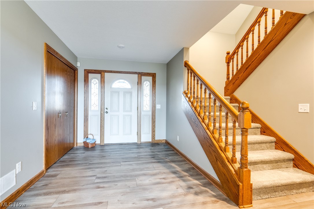 2949 Mill Ridge Circle Northwest Canton, OH 44708 - Photo 5 of 29 Foyer with double coat closet