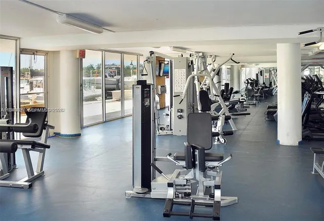 a view of a chairs and table in patio