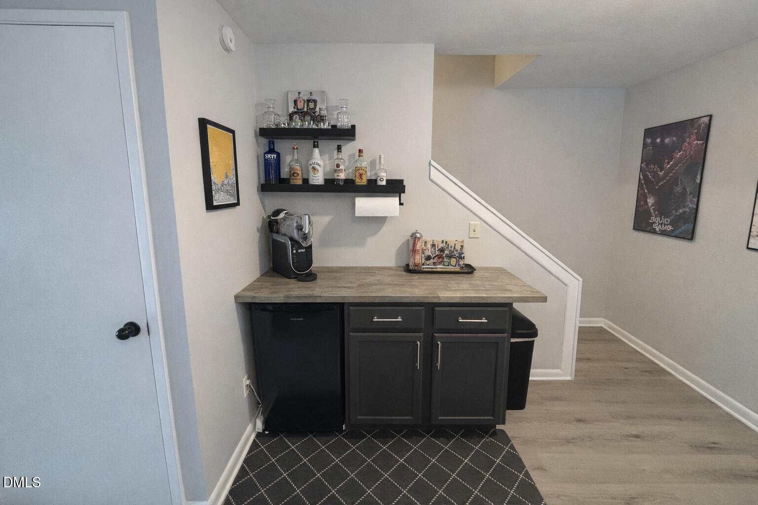 5045 Tall Pines Court Raleigh, NC 27609 - Photo 28 of 37 a view of a hallway with workspace