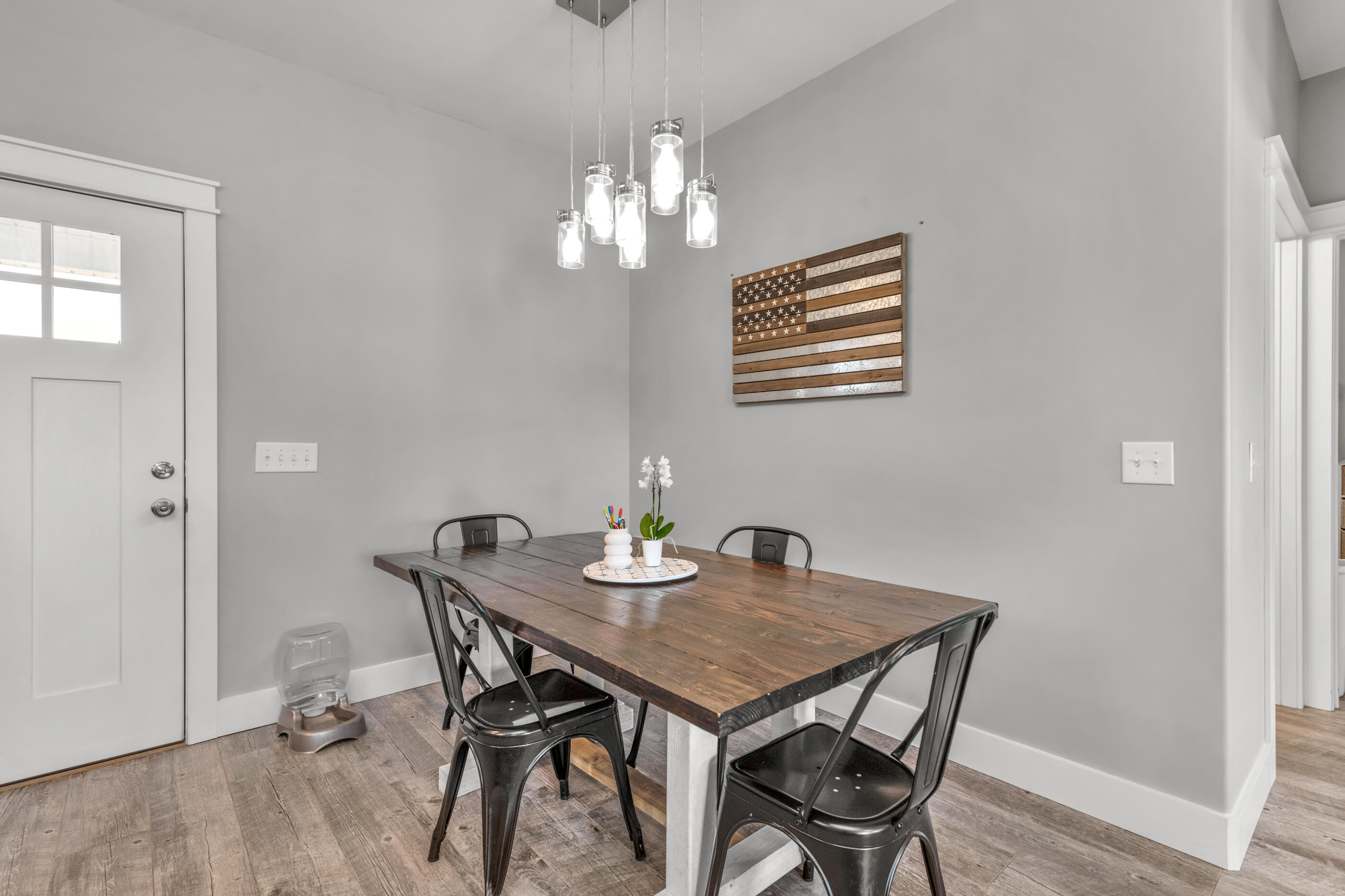 6116 Robin Road Crestview, FL 32539 - Photo 11 of 24 a view of a dining room with furniture and chandelier