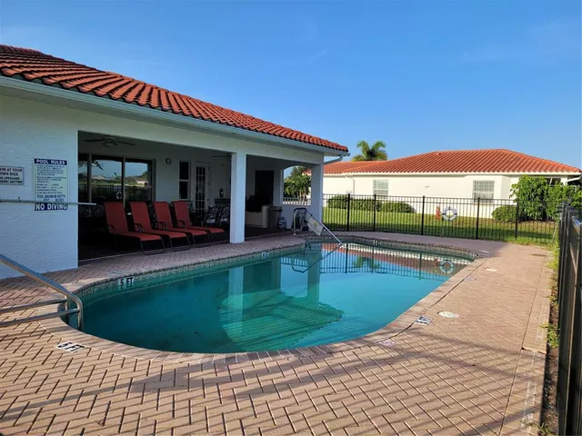 a view of a house with a swimming pool
